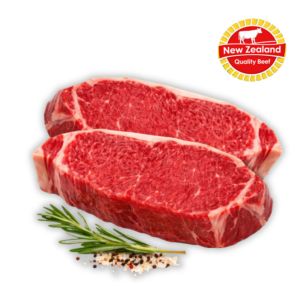 Two raw steaks with a sprig of rosemary and peppercorns on a white background, featuring the New Zealand Quality Beef logo.